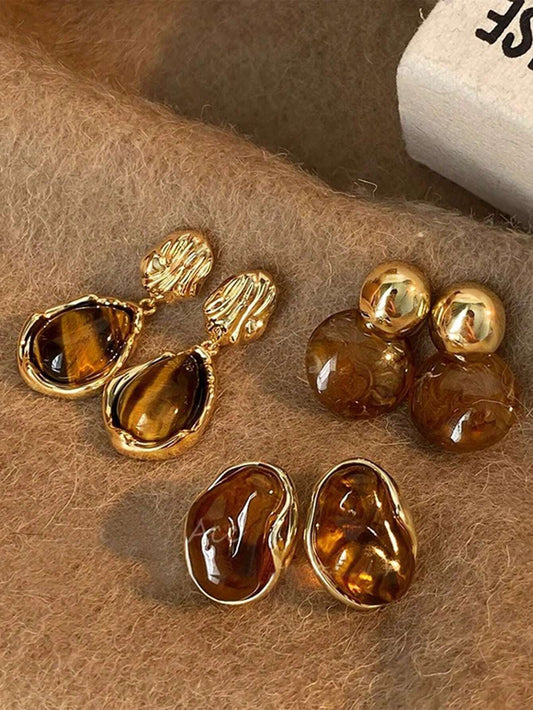 3 paires de boucles d'oreilles vintage élégantes aux couleurs ambrées